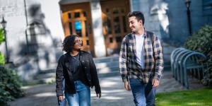 Two students walking to class together